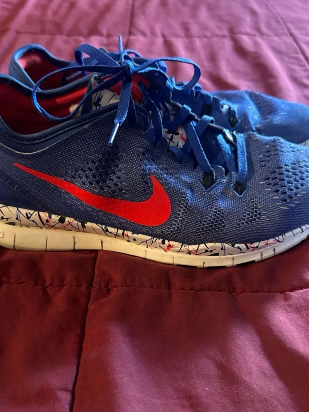 Nike Women’s Blue Athletic Shoes with Red Swoosh